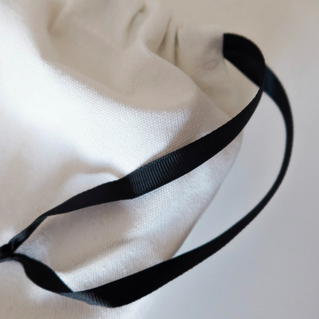 Pochette Signature et protectrice en Lin